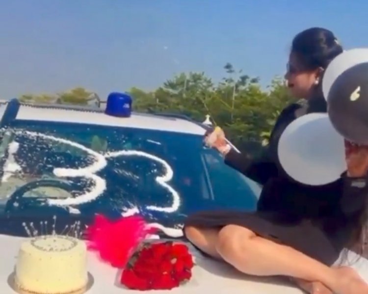 नीली बत्ती लगी सरकारी वाहन के बोनट पर बर्थडे रील बनाने वाली DSP के पत्नी पर अपराध दर्ज